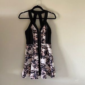 Black and pink patterned mini dress